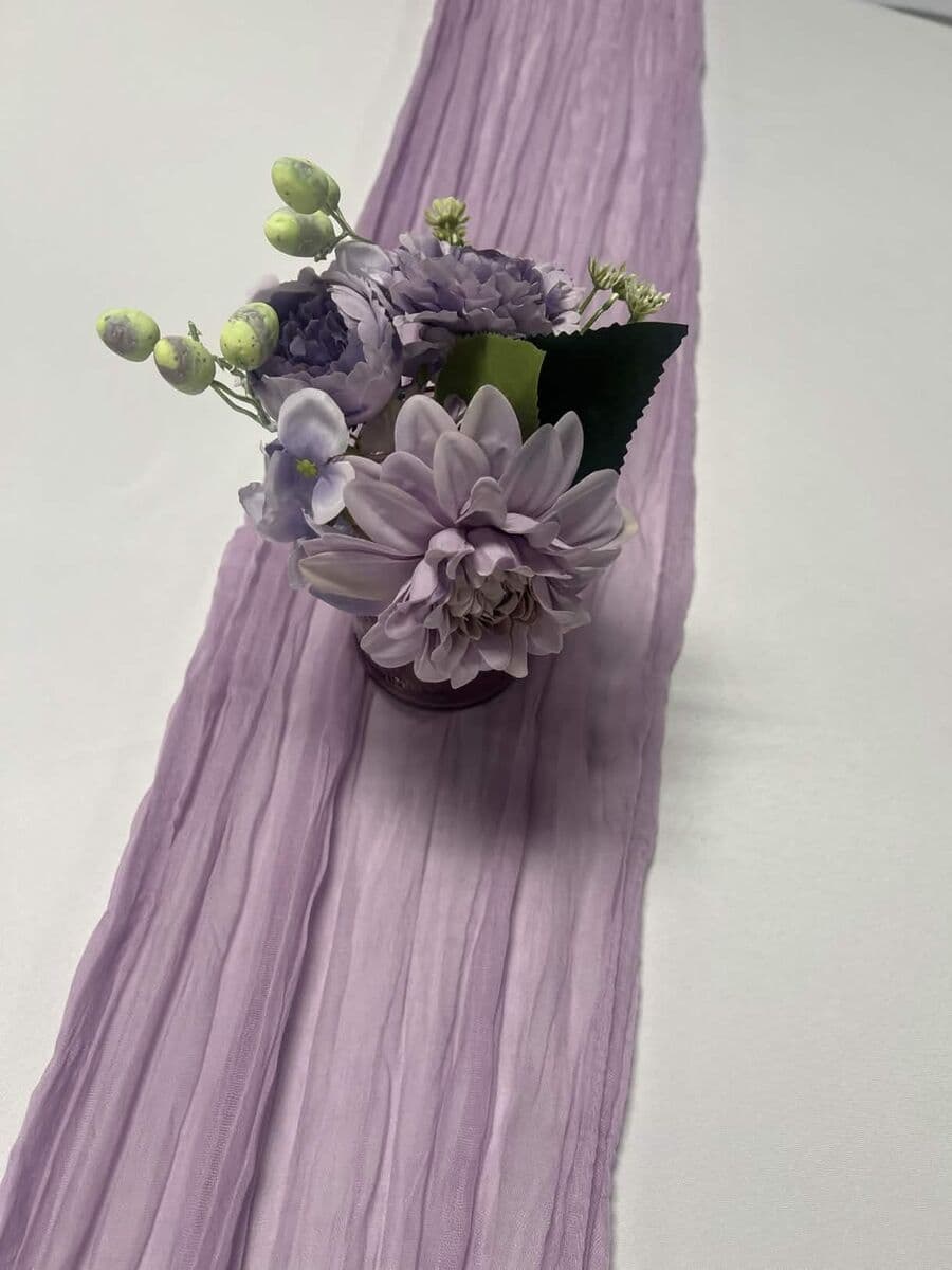 Elegant lavender floral centerpiece at LSC Event Space wedding venue